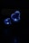 A glowing blue heart-shaped light is positioned on a dark background. The light emanates a soft, bluish glow, and there is another, smaller heart-shaped light blurred in the foreground. The lighting creates a serene and calming atmosphere.