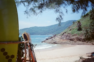 A serene early morning view of Legian Beach with surfboards lined up along the shore.