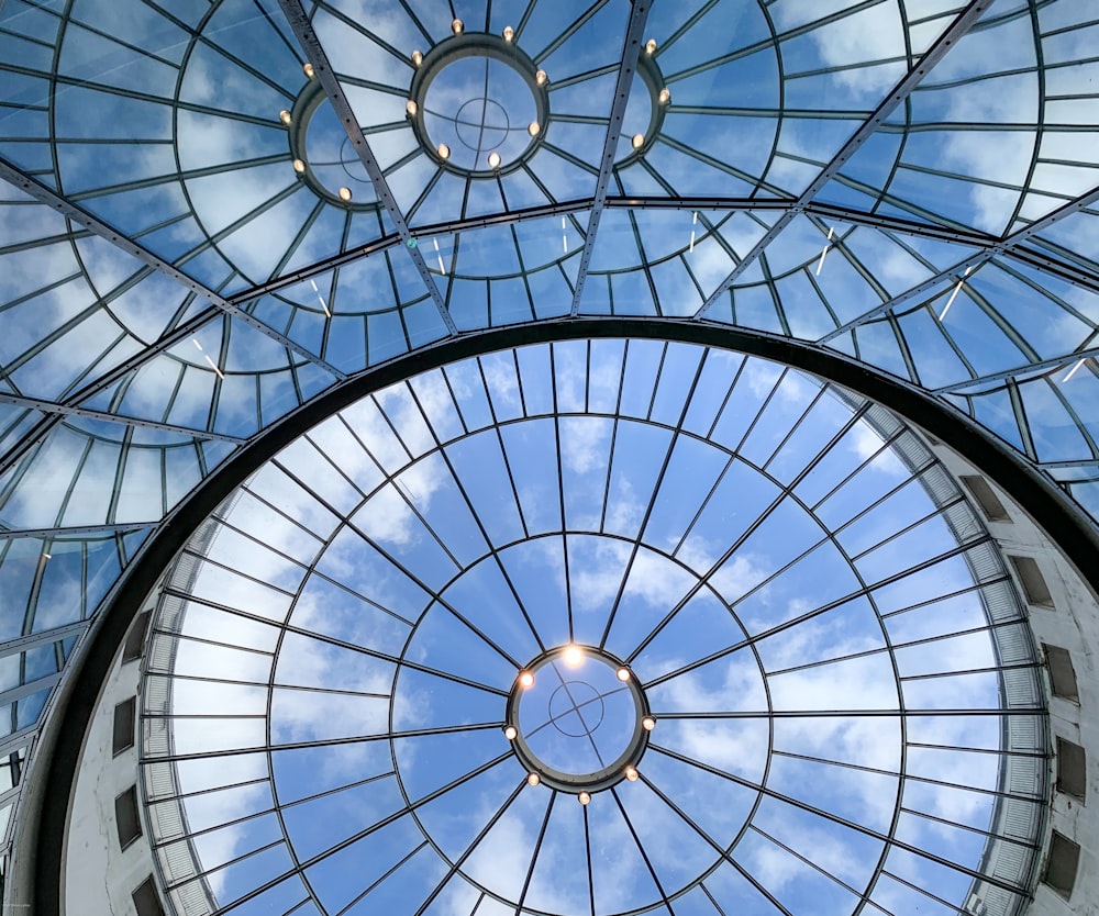 a view of the inside of a glass roof