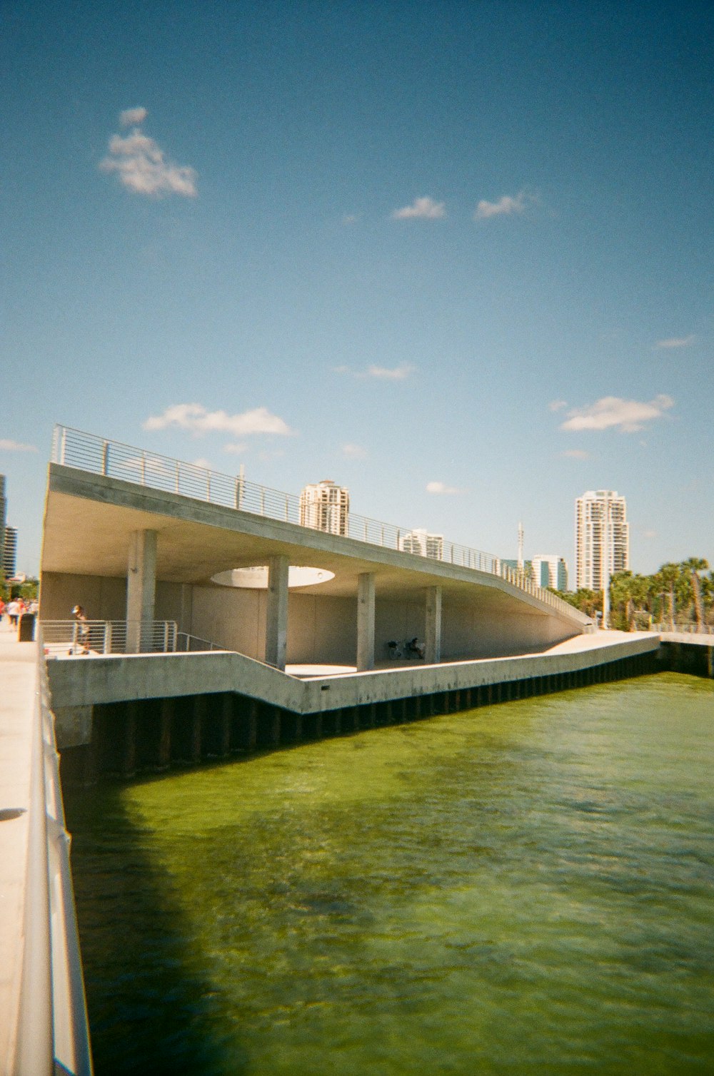 a large body of water next to a building