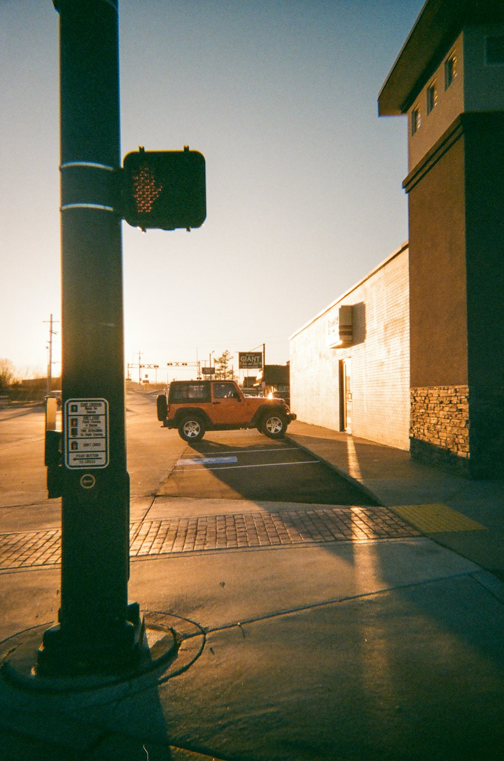 a traffic light sitting on the side of a road