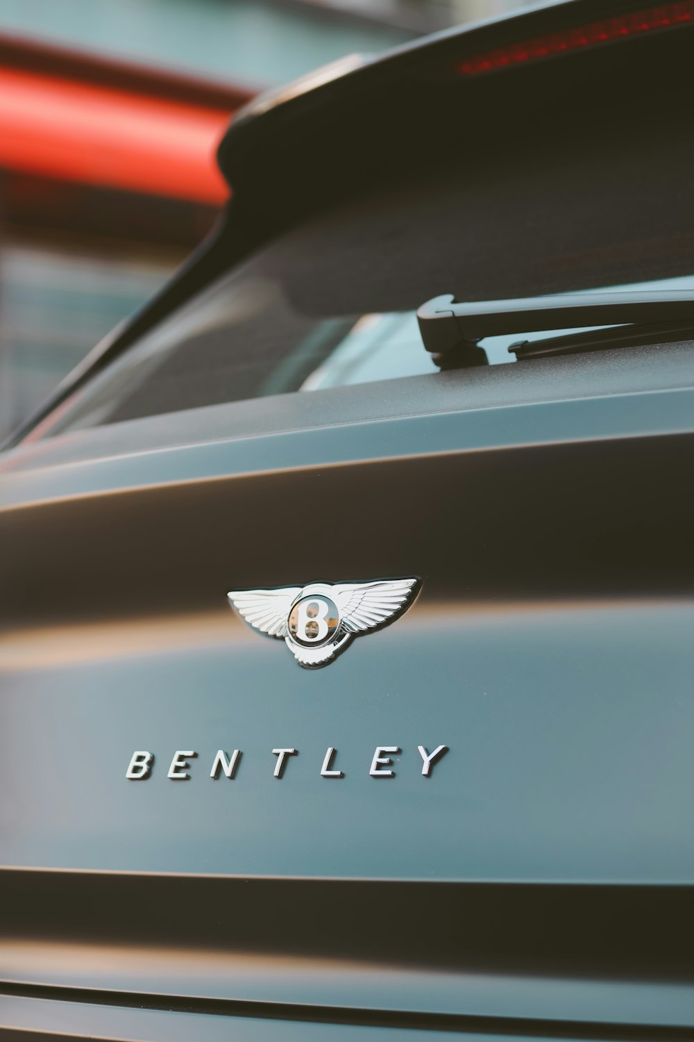 a bentley logo is shown on the side of a car