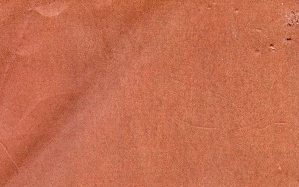 a close up of a piece of brown paper