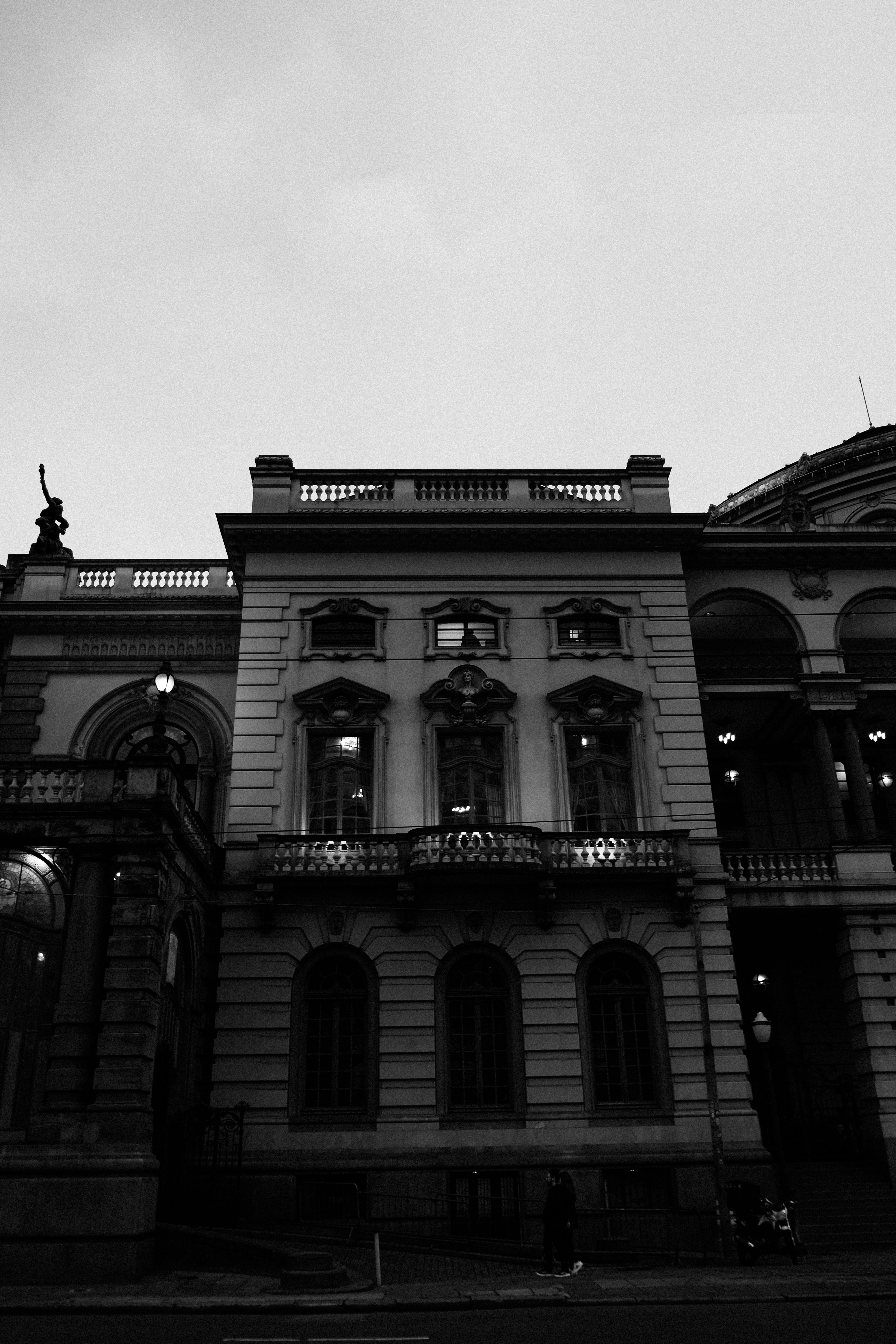 a black and white photo of a large building