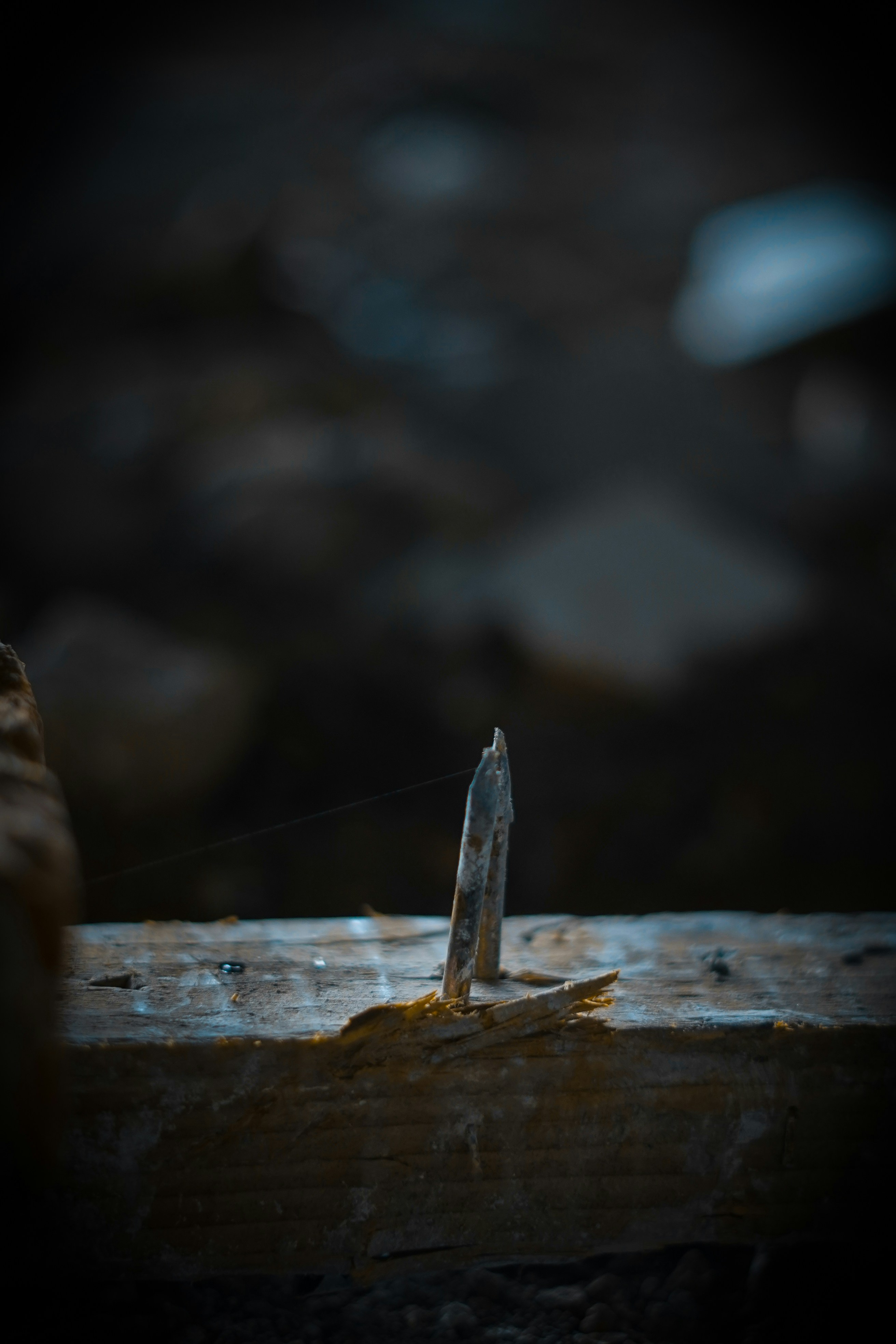 a piece of wood sitting on top of a wooden table