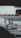 A fuel station with multiple fuel pumps and vehicles refueling.