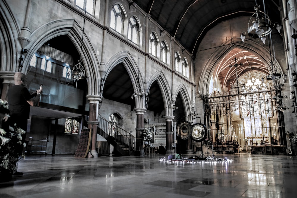 a large building with a bunch of clocks inside of it