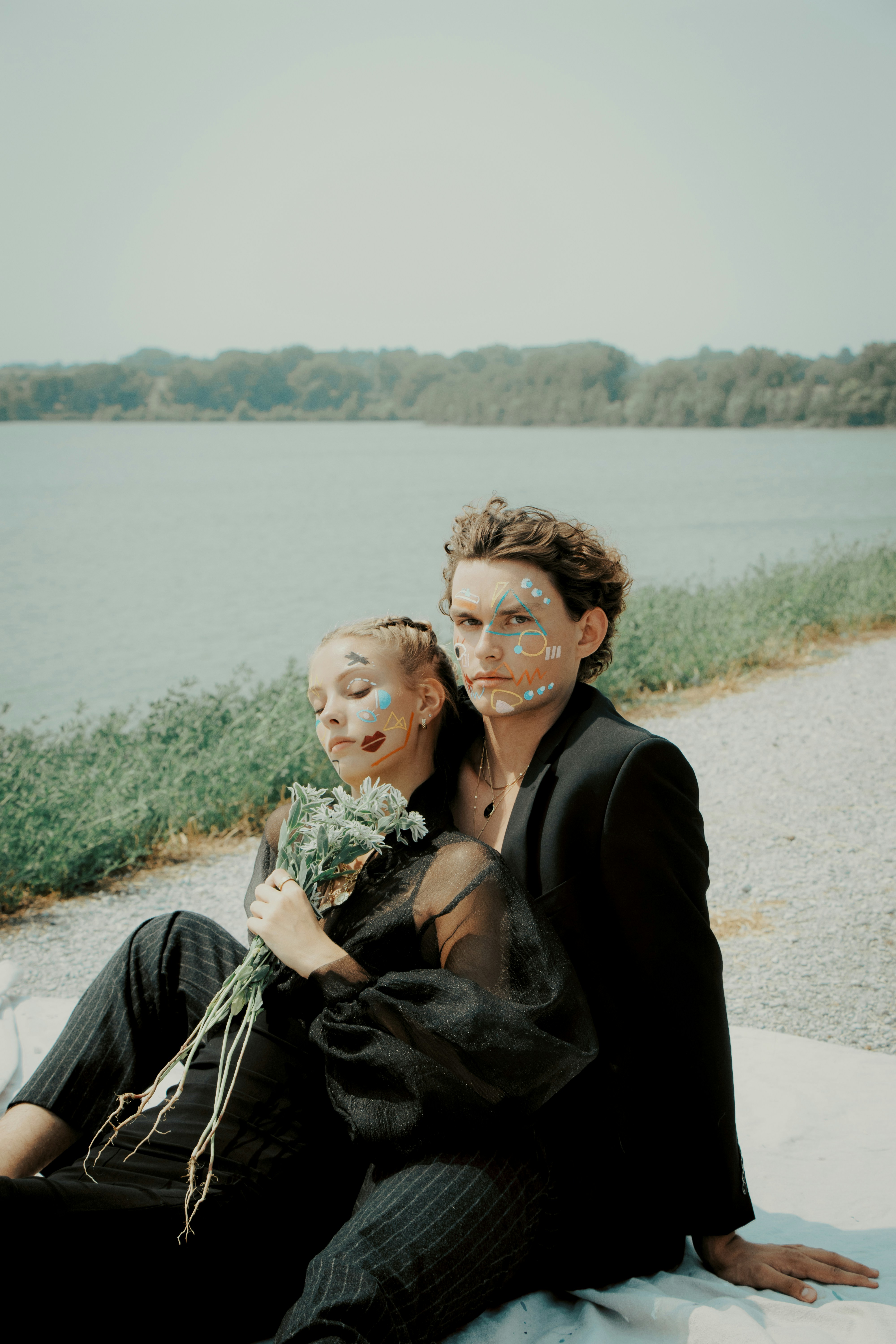 a couple of people that are sitting down