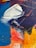 A vivid abstract painting featuring bold, sweeping strokes of color. The canvas includes rich shades of blue, red, yellow, and white, blending together to create dynamic shapes and textures. Thick, textured layers of paint are applied, with visible brushstrokes and a sense of movement and energy.