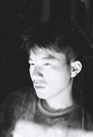 A candid portrait of a person immersed in thought.