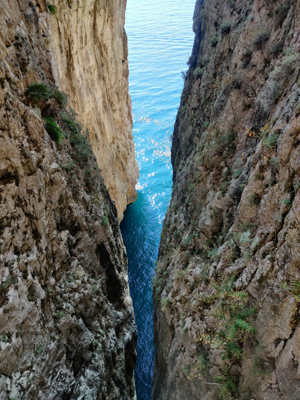 a view of the ocean from a high cliff
