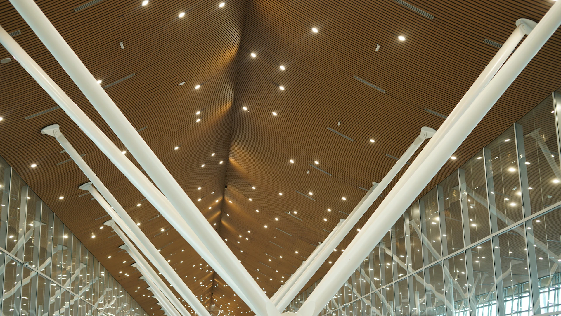 woman wearing yellow long-sleeved dress under white clouds and blue sky during daytime