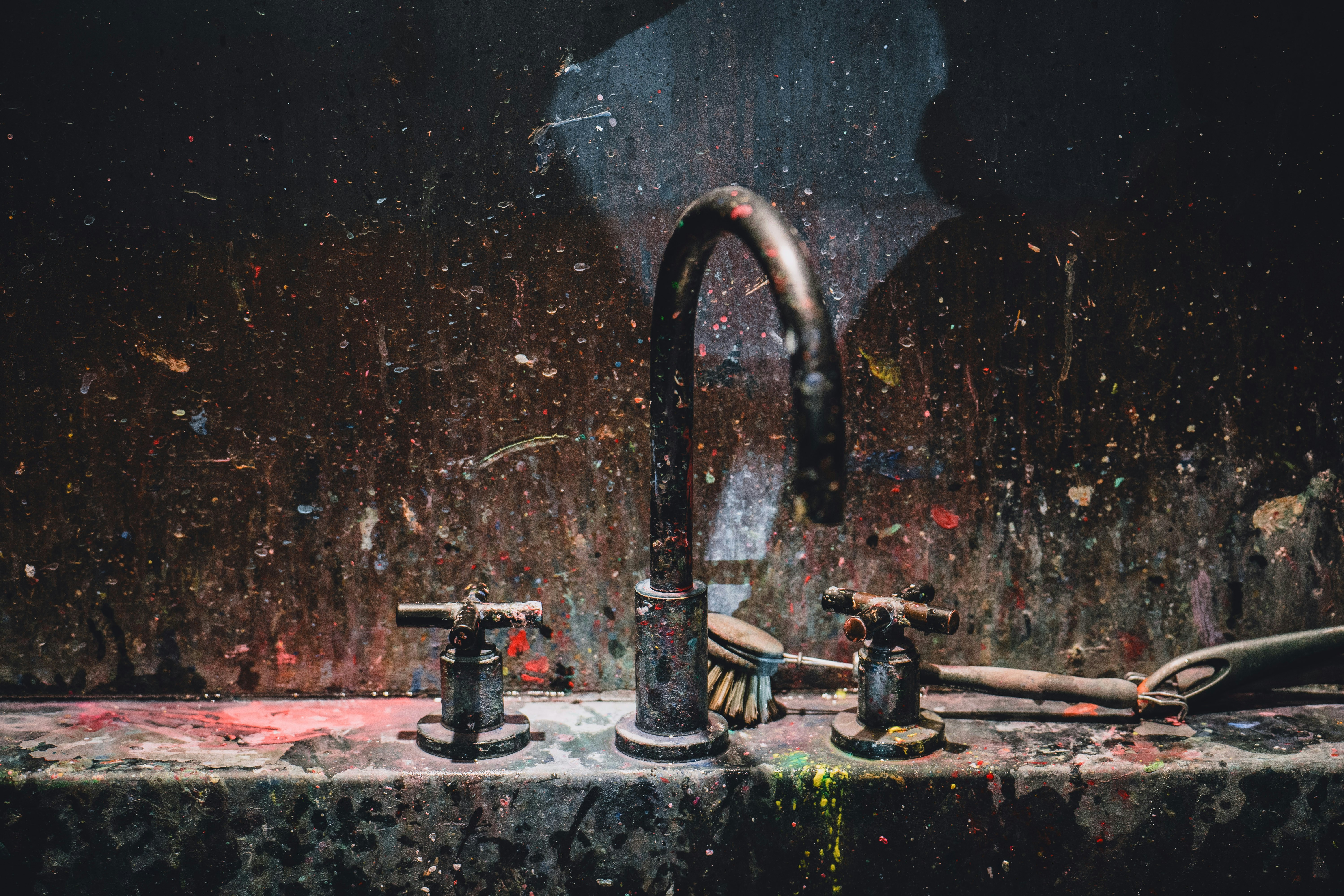 Clogged kitchen sink with standing water and debris - drain cleaning Covington