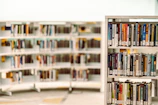 Volunteers sorting donated books in a bright community center