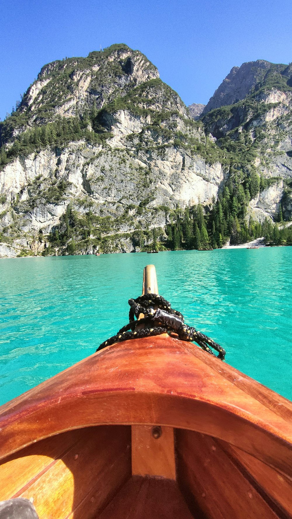 a view from the front of a boat on a lake