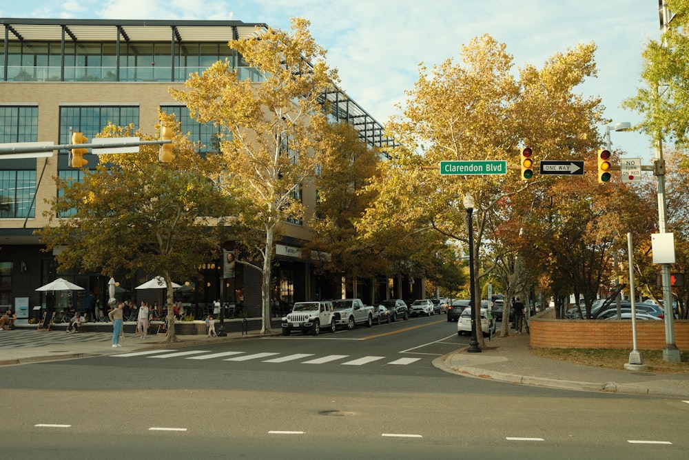 a street corner with cars parked on the side of the road