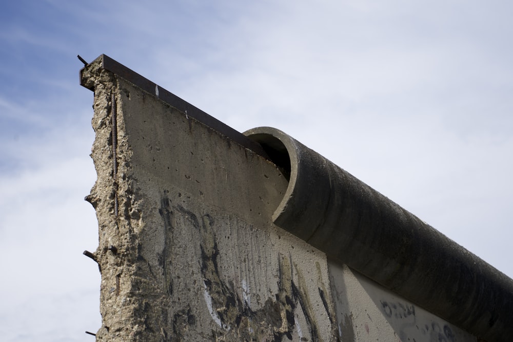 a pipe sticking out of the side of a building