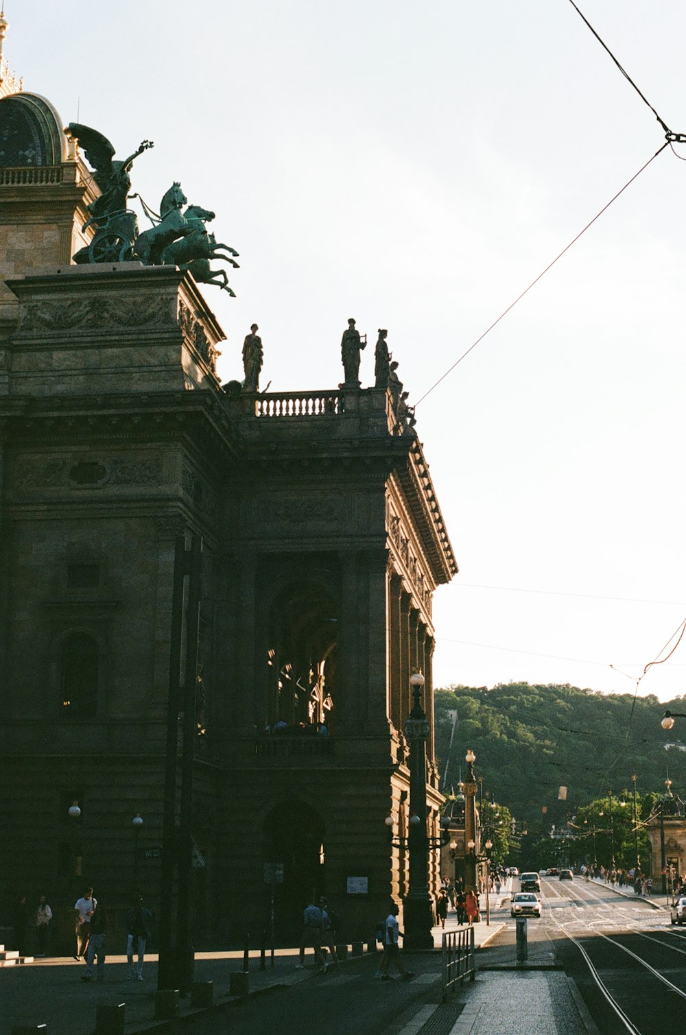 a large building with statues on top of it