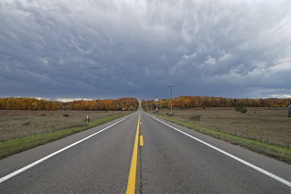 a road with a yellow line in the middle of it