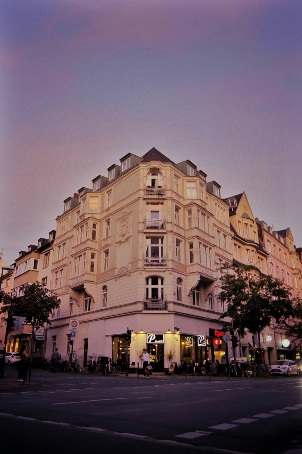 a large building with a lot of windows on the top of it