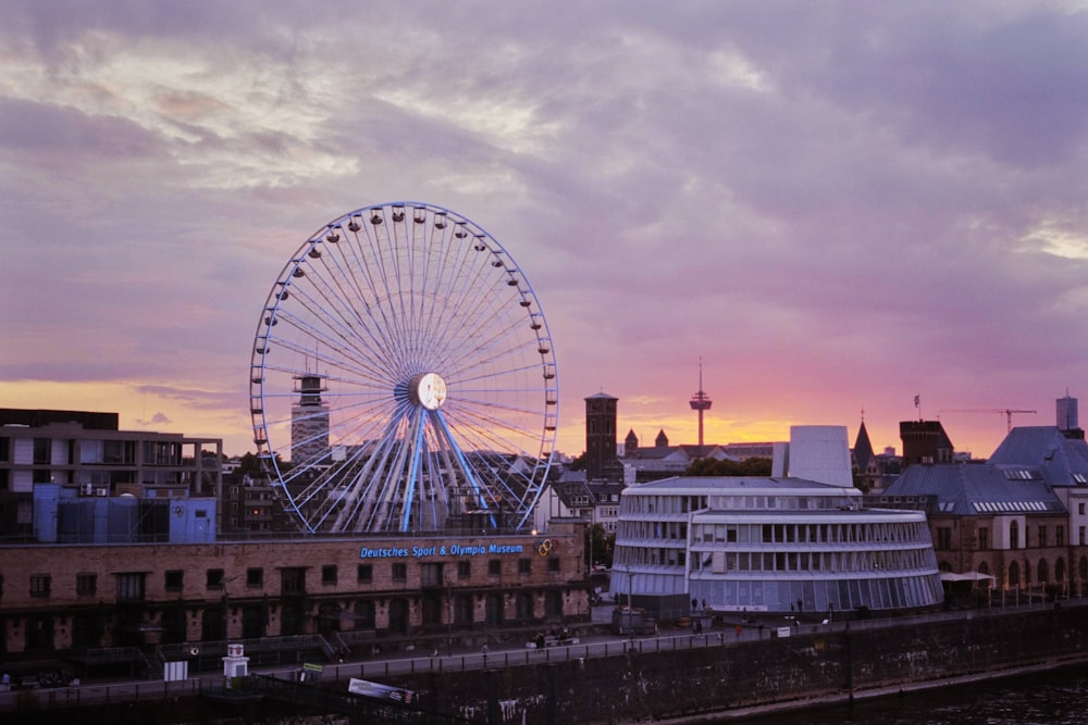 a ferris wheel in the middle of a city