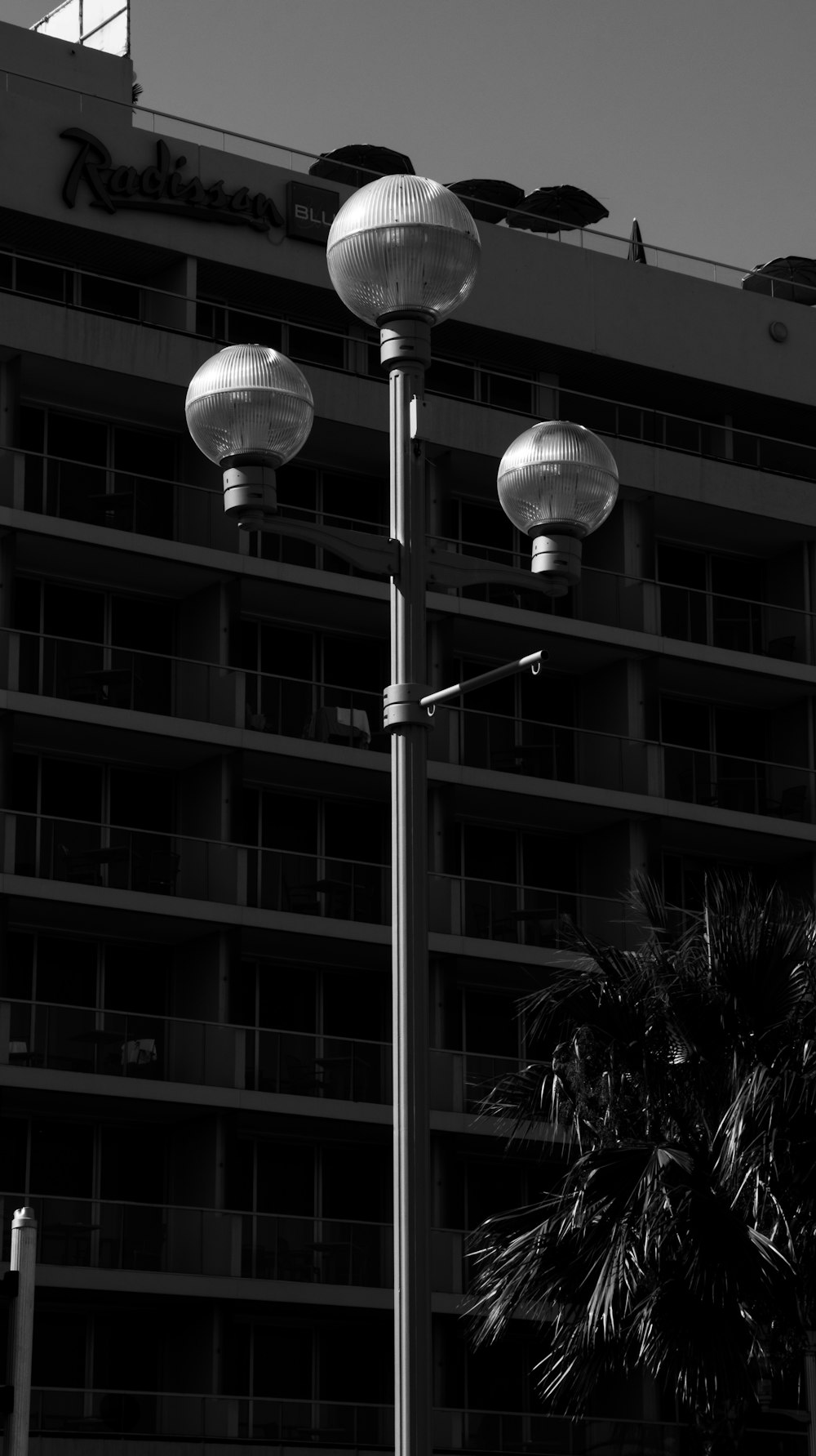 a black and white photo of a tall building