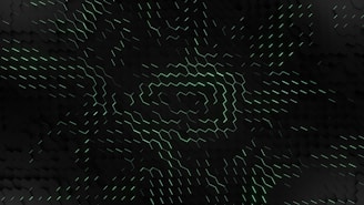 A geometric pattern comprised of hexagonal shapes with a three-dimensional appearance, featuring glowing green lines forming a spiral or vortex-like design on a dark background.