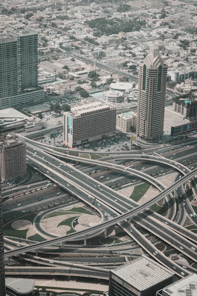 an aerial view of a highway intersection in a city