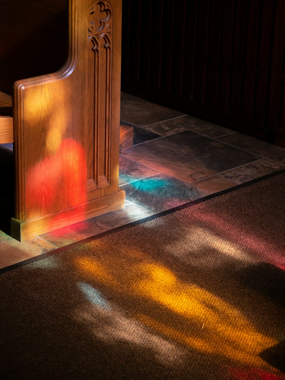 the sunlight is shining through the stained glass