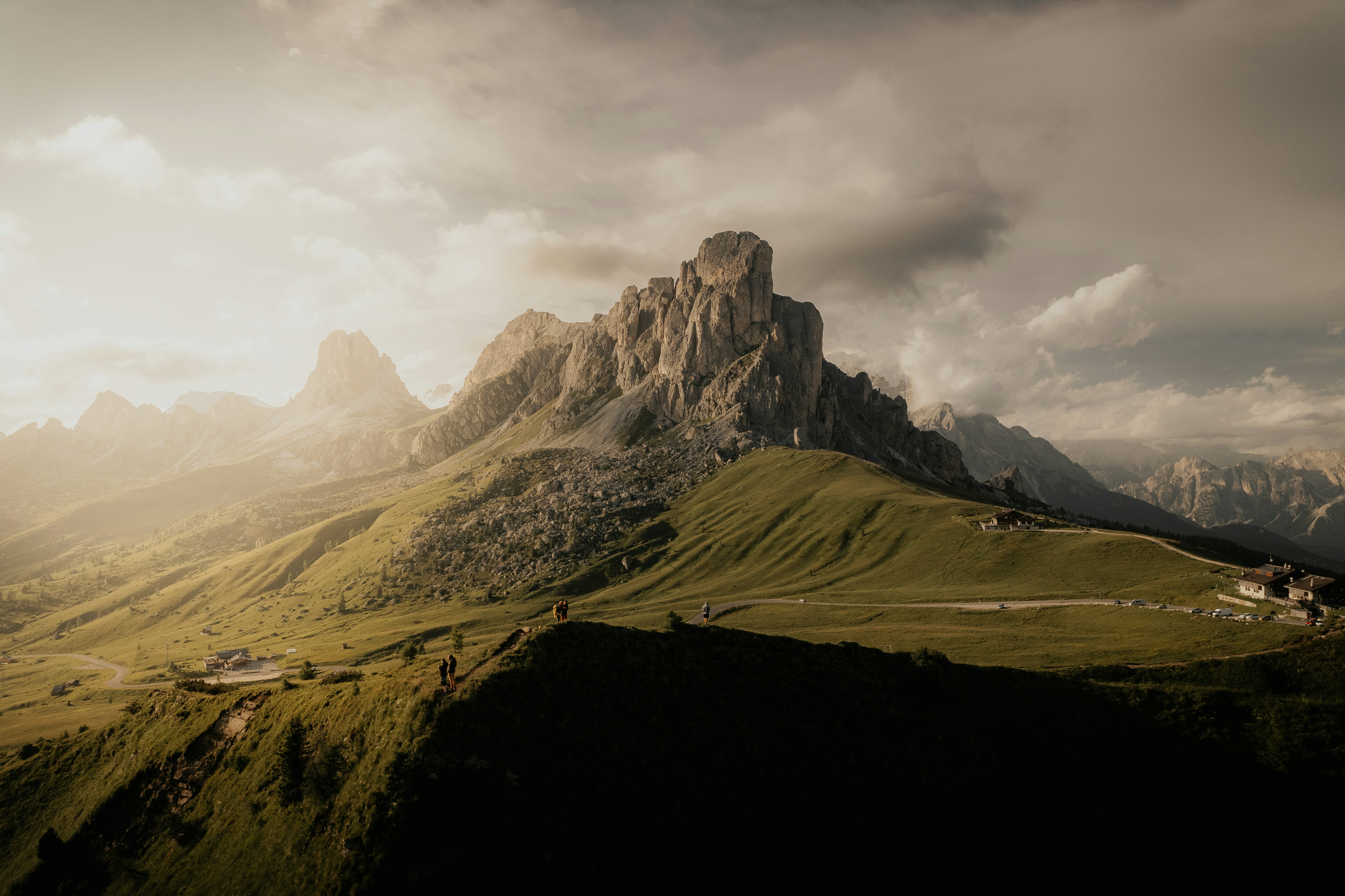 a view of a mountain range with clouds in the sky