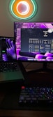 Futuristic workspace with multiple screens displaying data and AI interfaces.