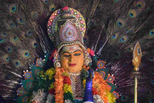 Vibrant depiction of Vasanta, god of spring, with flowers in full bloom.