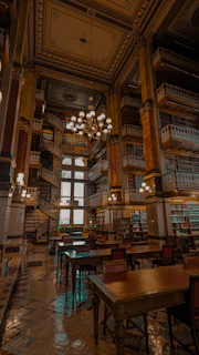 a large room with many tables and chairs