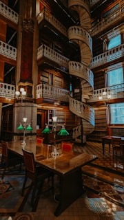 a room with a spiral staircase in the middle of it