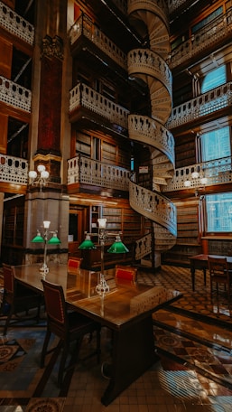 a room with a spiral staircase in the middle of it