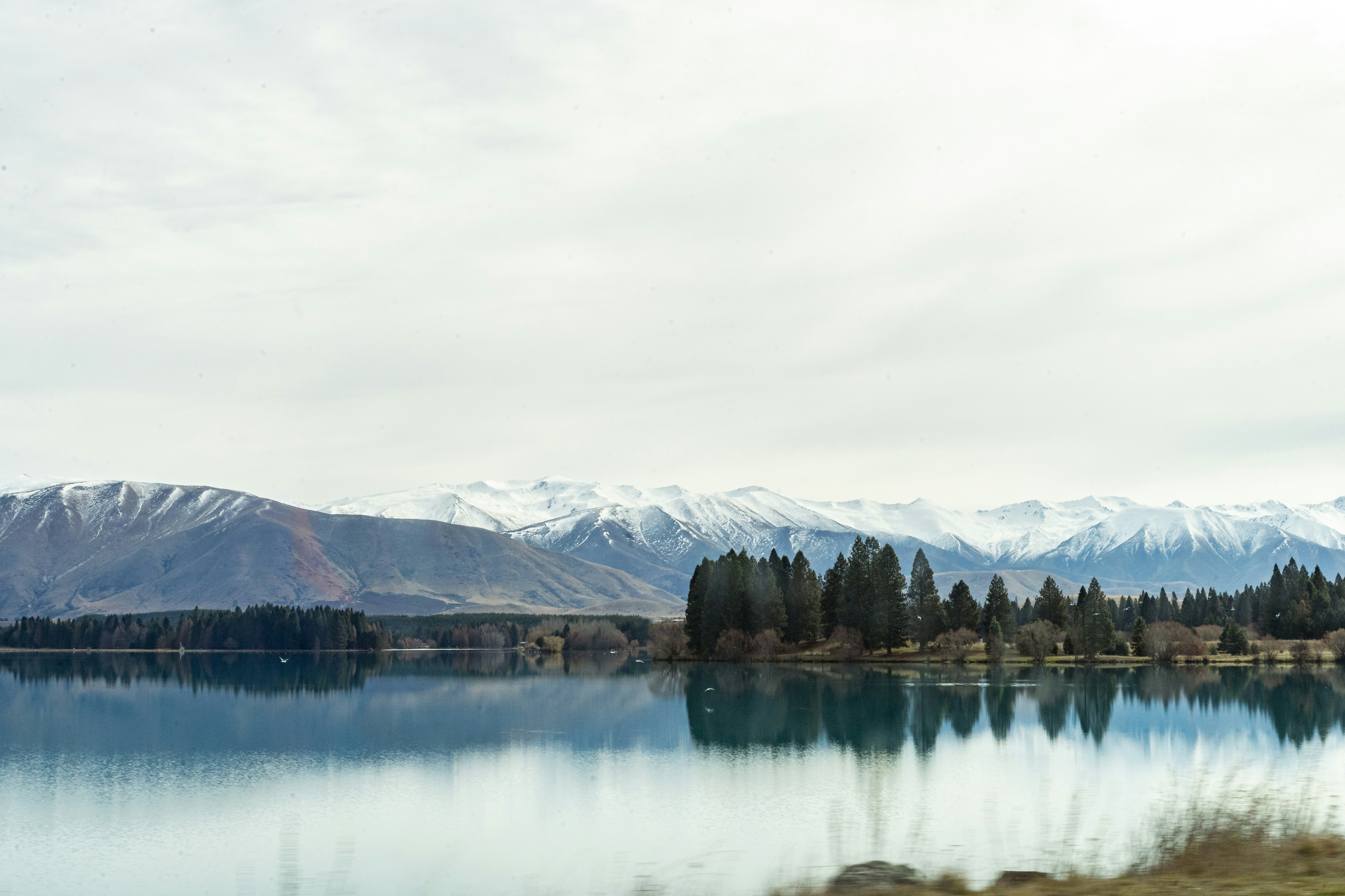 a large body of water surrounded by mountains