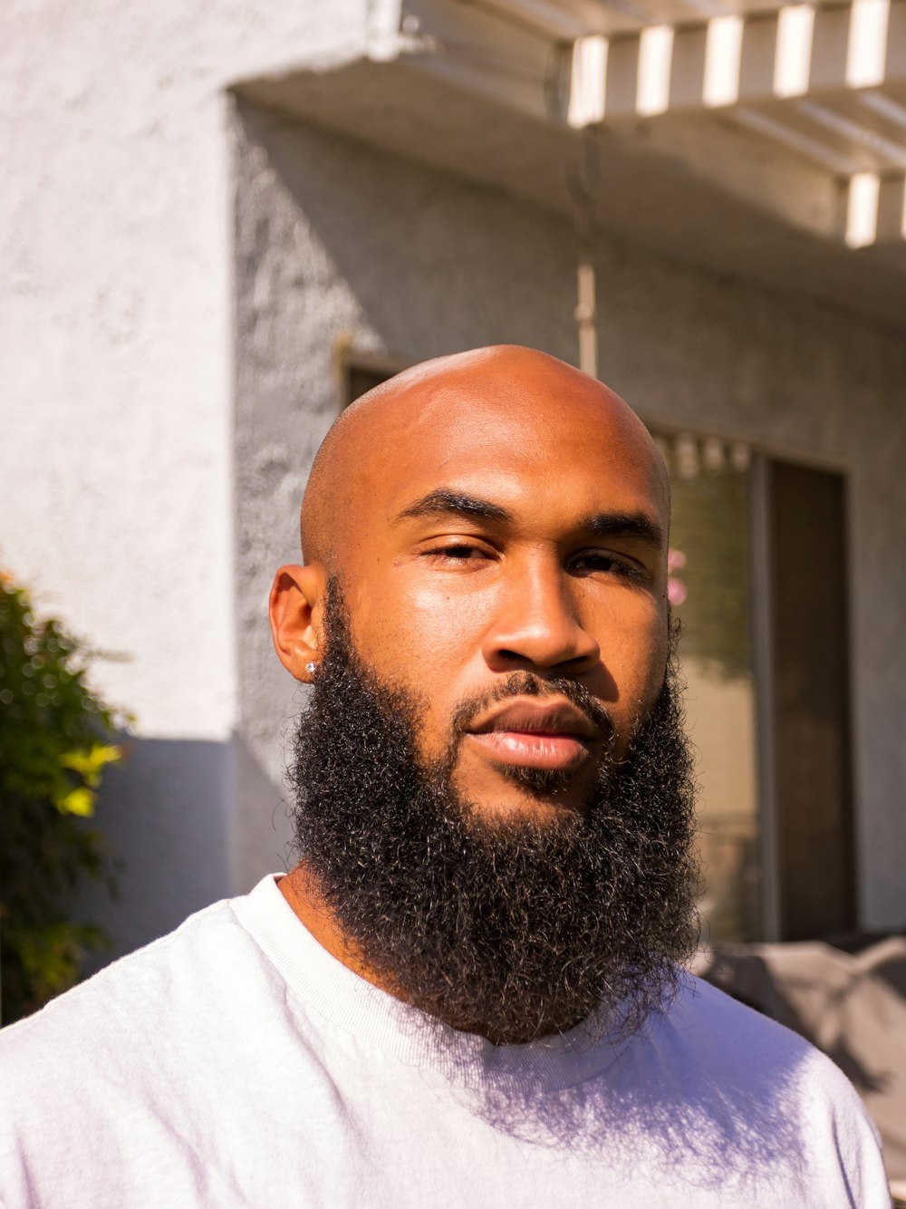 a close up of a person with a beard