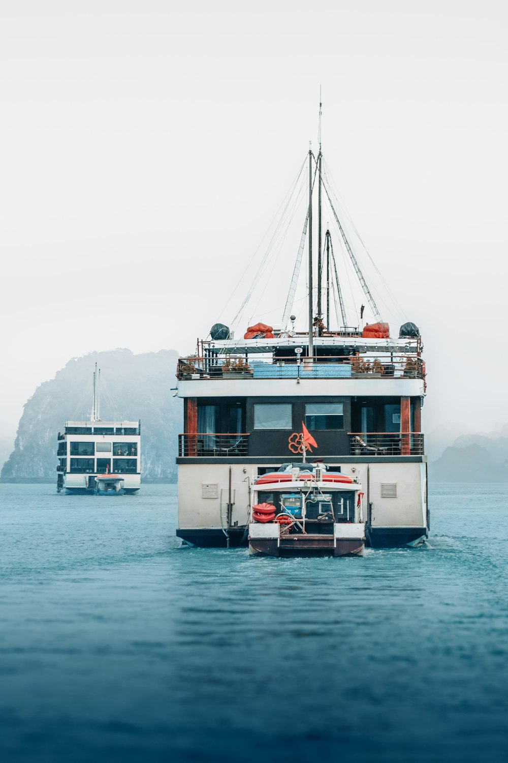 a large boat floating on top of a body of water