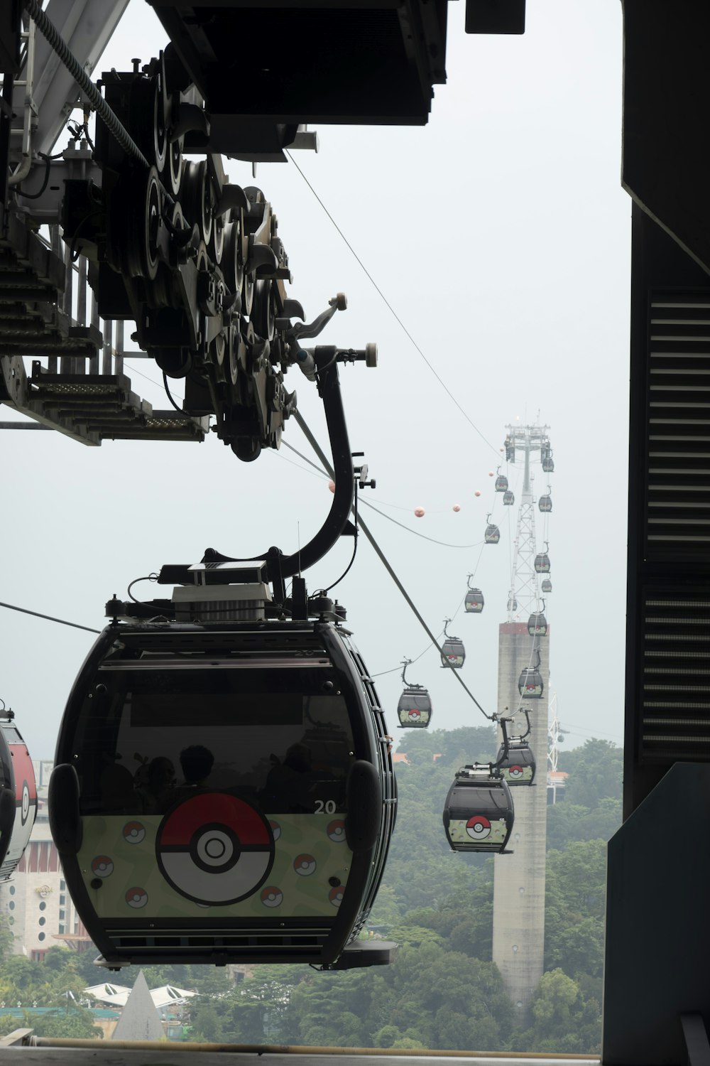 a gondola with a view of a city in the background