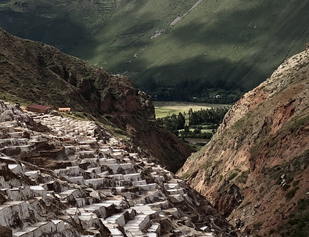 a view of a mountain with a lot of rocks in the foreground