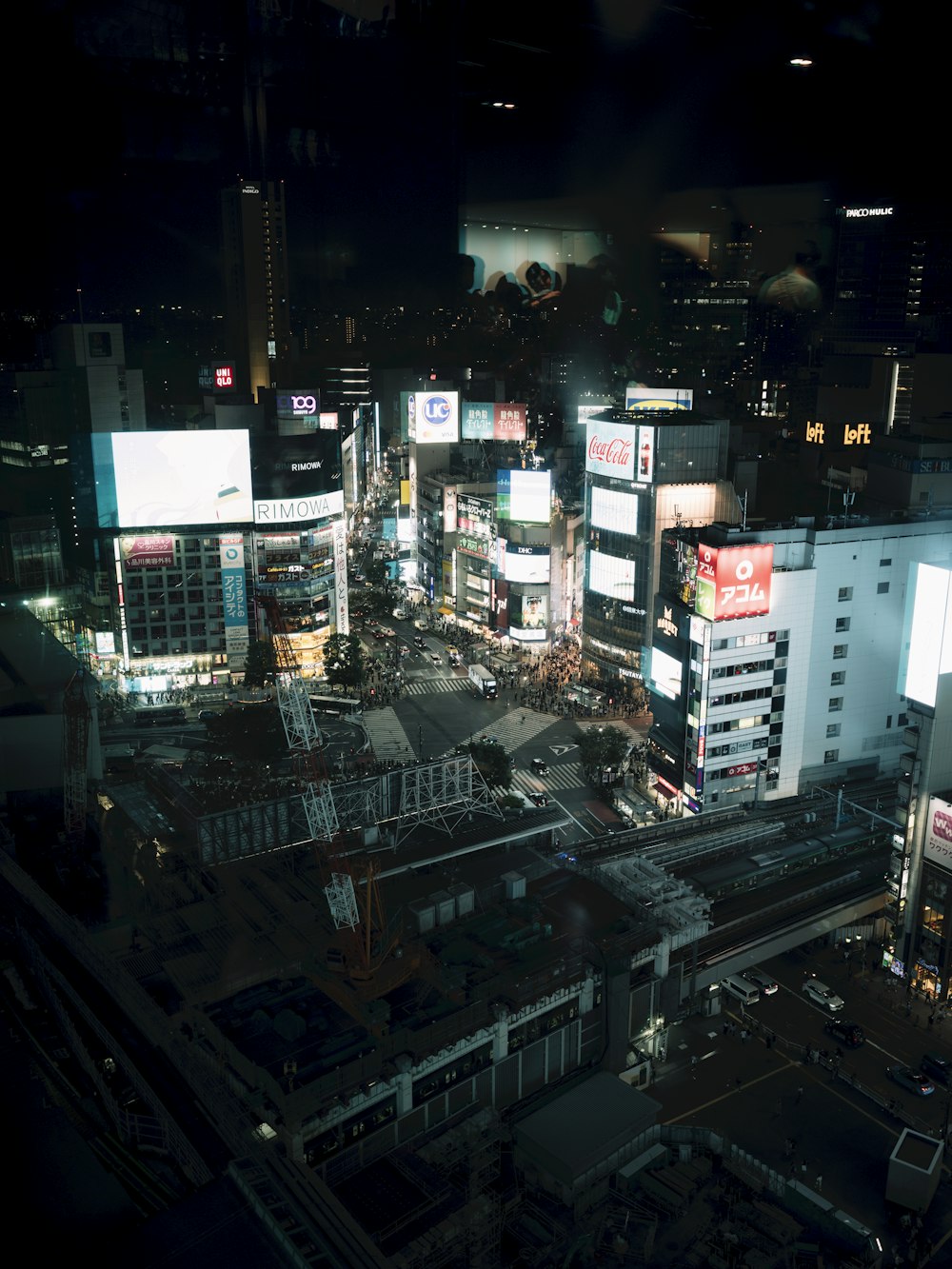 an aerial view of a city at night