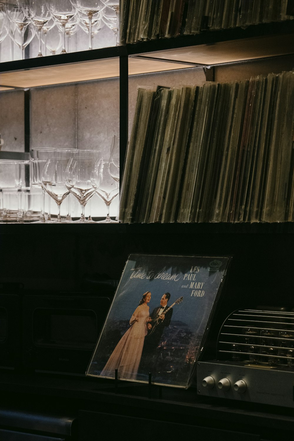 a record player sitting next to a record player