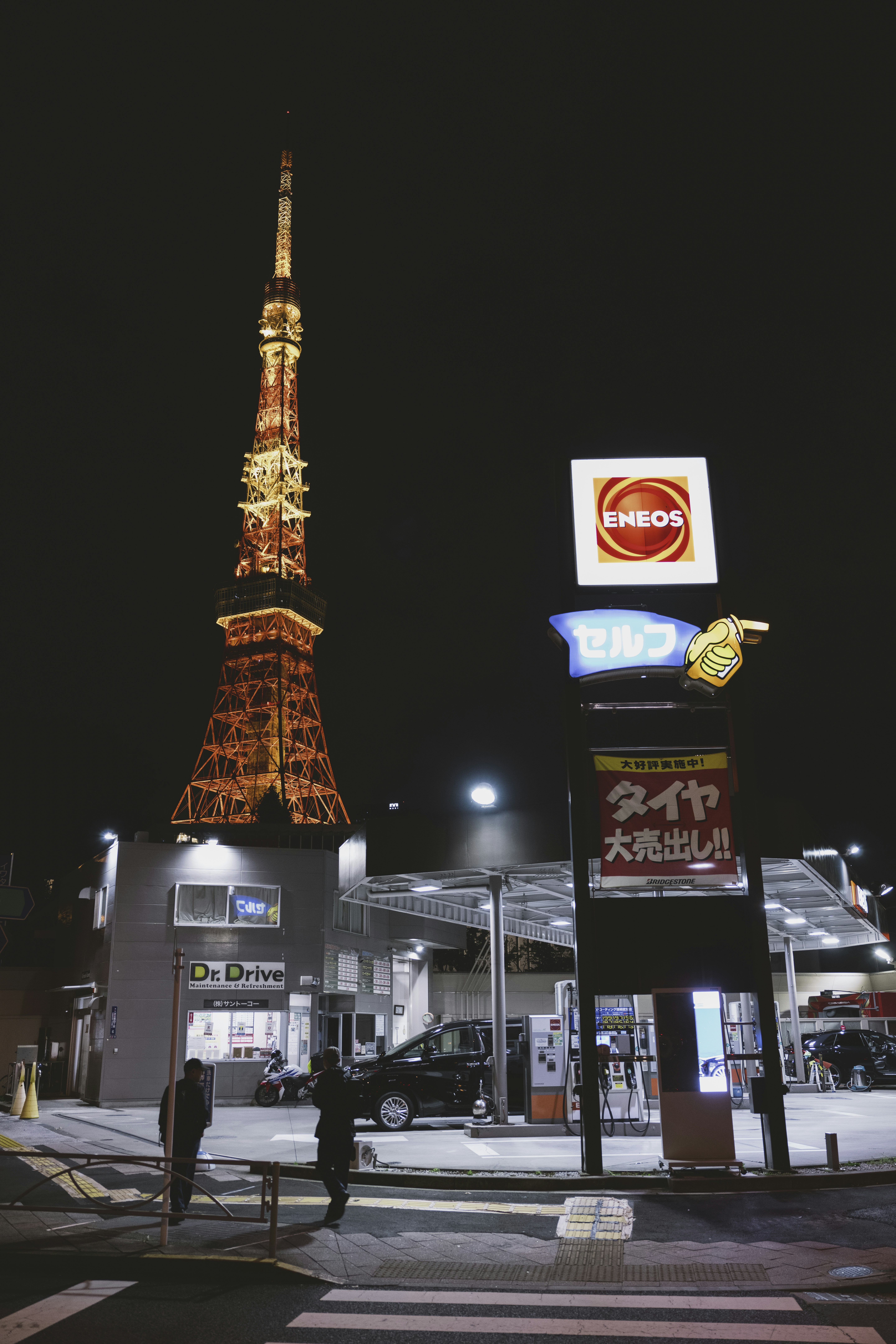 the eiffel tower is lit up at night