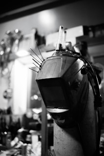 Close-up of welding machines and accessories on display.