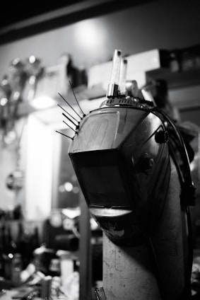 Close-up of welding machines and accessories on display.