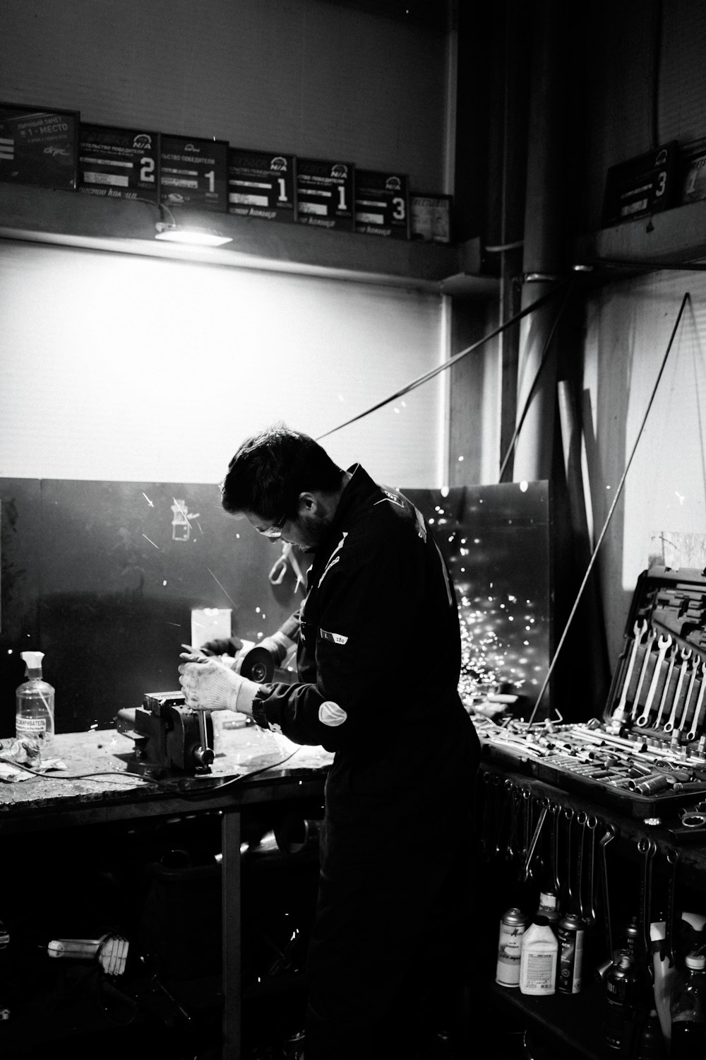 a man standing in a kitchen preparing food