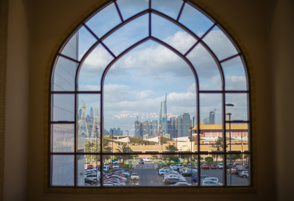 a view of a city through a stained glass window