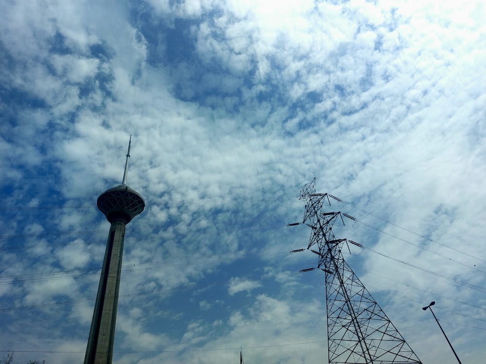 a tall tower sitting next to a radio tower