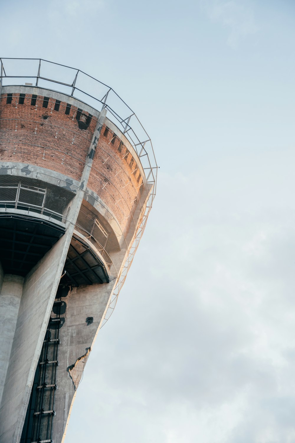 a very tall tower with a sky in the background