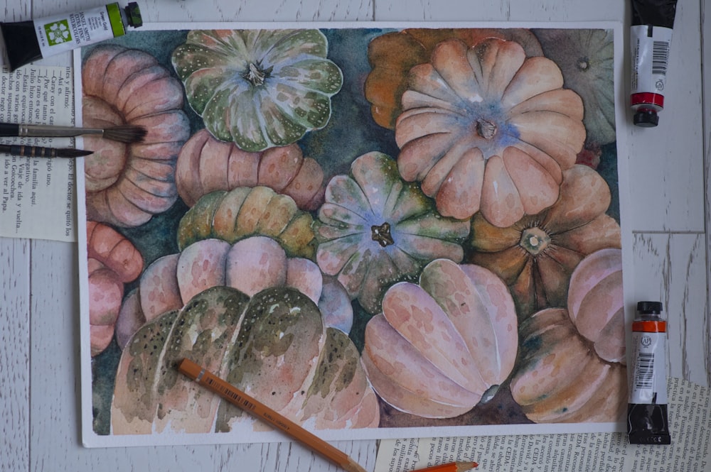 un dessin d’un bouquet de citrouilles sur un morceau de papier